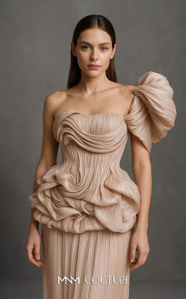 MNM Couture B1181 beige pleated chiffon gown with an asymmetric oversized shoulder ruffle and a large rosette detail on the waist. | Couture Shop LA