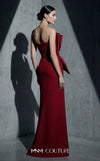 MNM Couture Style B1188 strapless column gown with an asymmetrical pleated neckline, side slit, and beaded floral peplum. | Couture Shop LA