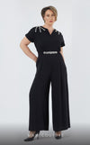 GLAM by MNM Couture DZ431B short sleeve V-neck jumpsuit with classic design. | Couture Shop LA