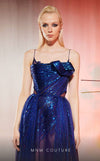 MNM Couture Style E0049 in royal blue, showcasing an A-line silhouette in embroidered mesh, an asymmetric neckline with a knot, spaghetti straps, and a dramatic back skirt. | Couture Shop LA.