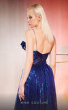 MNM Couture Style E0049 in royal blue, showcasing an A-line silhouette in embroidered mesh, an asymmetric neckline with a knot, spaghetti straps, and a dramatic back skirt. | Couture Shop LA.
