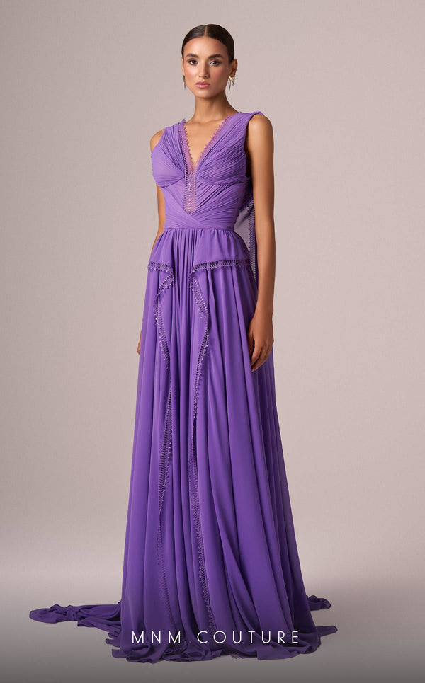 MNM Couture Style E0086 showcasing a flared silk gown with a V-neckline, sleeveless design, pleated bust, and long capes falling from the shoulders to create a train. | Couture Shop LA