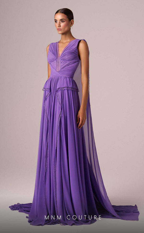 MNM Couture Style E0086 showcasing a flared silk gown with a V-neckline, sleeveless design, pleated bust, and long capes falling from the shoulders to create a train. | Couture Shop LA