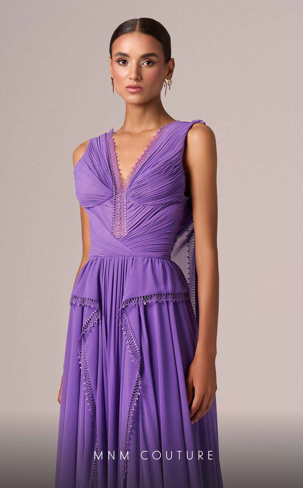 MNM Couture Style E0086 showcasing a flared silk gown with a V-neckline, sleeveless design, pleated bust, and long capes falling from the shoulders to create a train. | Couture Shop LA