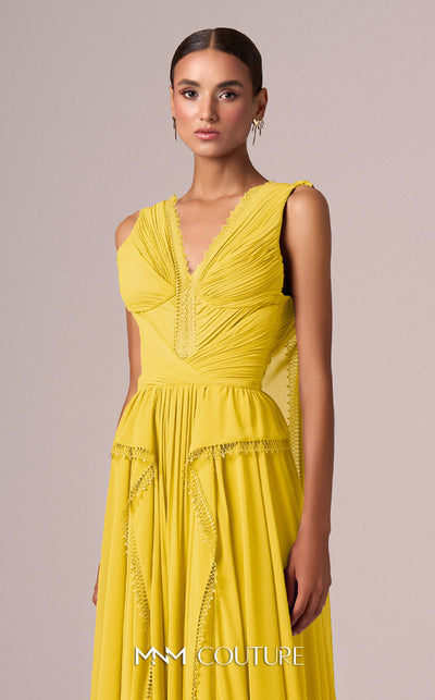 MNM Couture Style E0086 showcasing a flared silk gown with a V-neckline, sleeveless design, pleated bust, and long capes falling from the shoulders to create a train. | Couture Shop LA