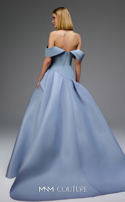 MNM Couture Style E0103 in ice blue, featuring an A-line silhouette with a pleated off-the-shoulder neckline, a fitted corset bodice, and a draped sash at the waist.| Couture Shop LA