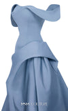 MNM Couture Style E0103 in ice blue, featuring an A-line silhouette with a pleated off-the-shoulder neckline, a fitted corset bodice, and a draped sash at the waist.| Couture Shop LA