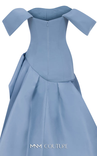 MNM Couture Style E0103 in ice blue, featuring an A-line silhouette with a pleated off-the-shoulder neckline, a fitted corset bodice, and a draped sash at the waist.| Couture Shop LA