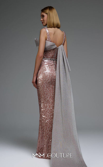 MNM Couture E0108 sequin-embellished fitted column gown with strap sleeves, asymmetric sweetheart neckline, and a flowing cape with a train. | Couture Shop LA