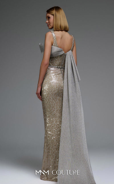 MNM Couture E0108 sequin-embellished fitted column gown with strap sleeves, asymmetric sweetheart neckline, and a flowing cape with a train. | Couture Shop LA