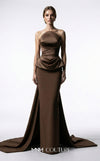 MNM Couture E0146 strapless draped satin mermaid gown with arched neckline, darted bust, illusion peplum, crisscross waist, and dramatic back train | Couture Shop LA.
