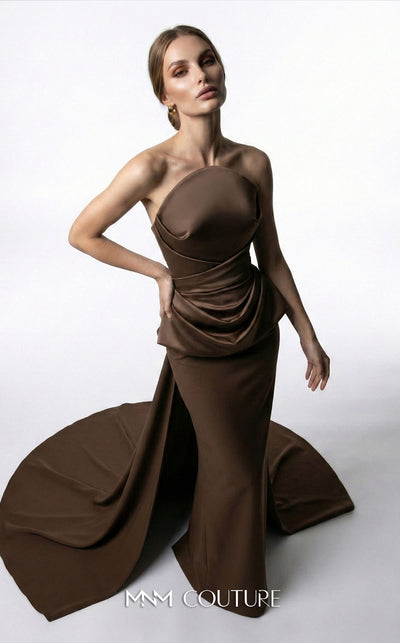 MNM Couture E0146 strapless draped satin mermaid gown with arched neckline, darted bust, illusion peplum, crisscross waist, and dramatic back train | Couture Shop LA.