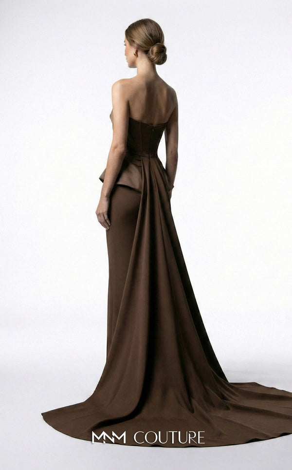 MNM Couture E0146 strapless draped satin mermaid gown with arched neckline, darted bust, illusion peplum, crisscross waist, and dramatic back train | Couture Shop LA.