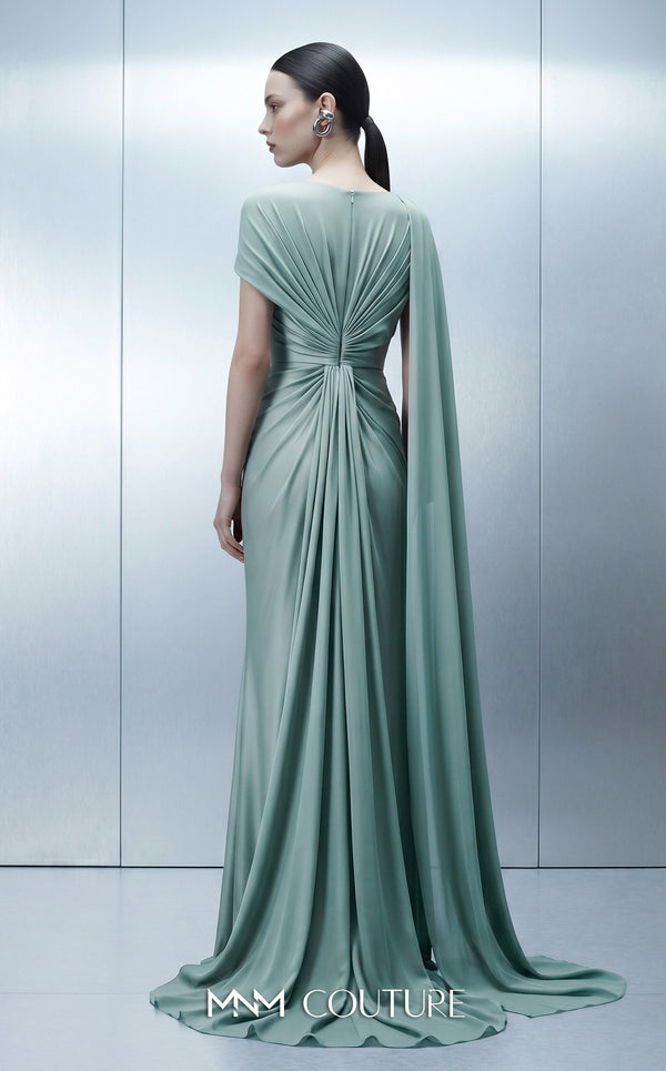MNM Couture E0160 satin and chiffon draped column gown with asymmetric dual sleeves, satin knot waist, cape sleeve, and back fan-pleat detail | Couture Shop LA.