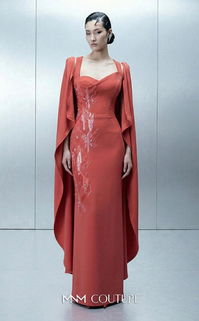 Long straight fitted crepe evening gown with an asymmetrical design and removable cape showcasing MNM Couture Style E0164 | Couture Shop LA.