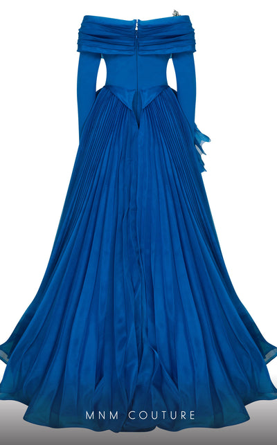 MNM Couture F02800: Off-shoulder crepe & organza gown, long sleeves, tassels, draped bust, Roman skirt, plisse tail. | Couture Shop LA