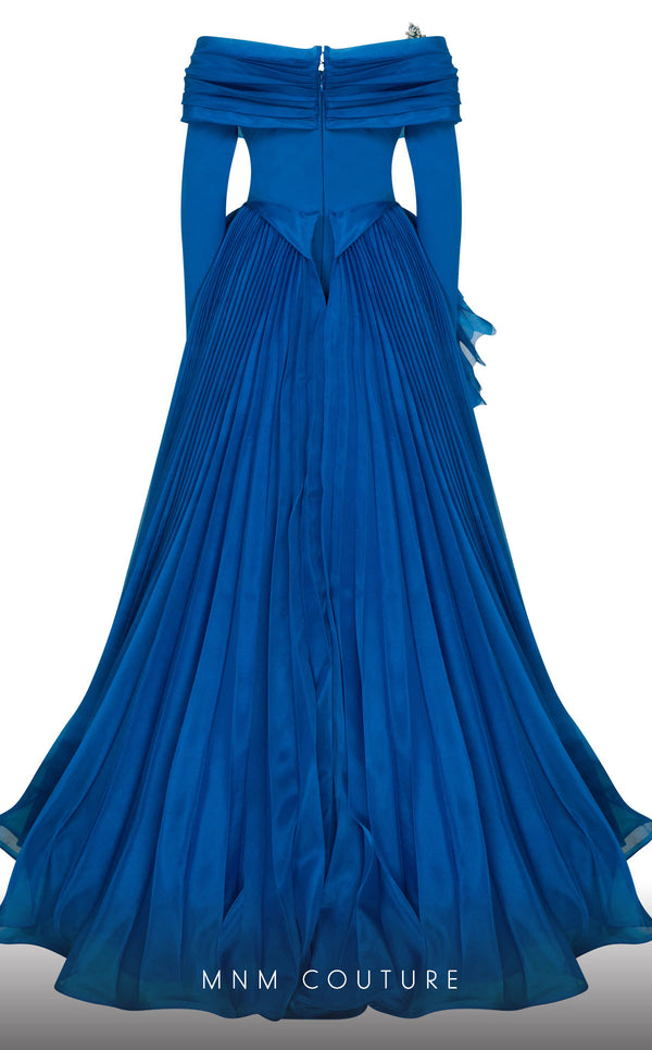 MNM Couture F02800: Off-shoulder crepe & organza gown, long sleeves, tassels, draped bust, Roman skirt, plisse tail. | Couture Shop LA