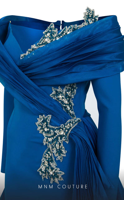 MNM Couture F02800: Off-shoulder crepe & organza gown, long sleeves, tassels, draped bust, Roman skirt, plisse tail. | Couture Shop LA