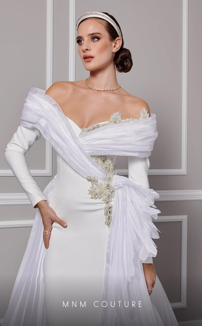 MNM Couture F02800: Off-shoulder crepe & organza gown, long sleeves, tassels, draped bust, Roman skirt, plisse tail. | Couture Shop LA