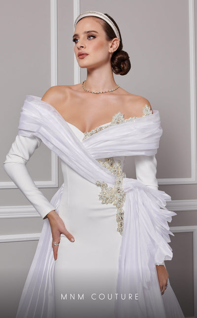 MNM Couture F02800: Off-shoulder crepe & organza gown, long sleeves, tassels, draped bust, Roman skirt, plisse tail. | Couture Shop LA