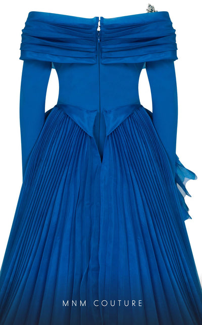 MNM Couture F02800: Off-shoulder crepe & organza gown, long sleeves, tassels, draped bust, Roman skirt, plisse tail. | Couture Shop LA