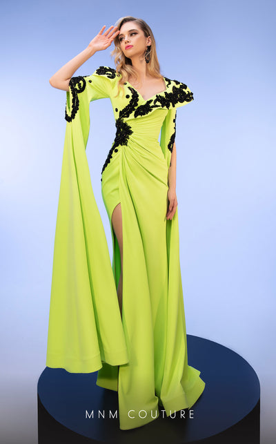 Radiate glamour in the sophisticated MNM Couture F02802 gown, deftly designed with a flattering V-neck cut and elegant tassel embellishments for the perfect evening allure. | Couture Shop LA