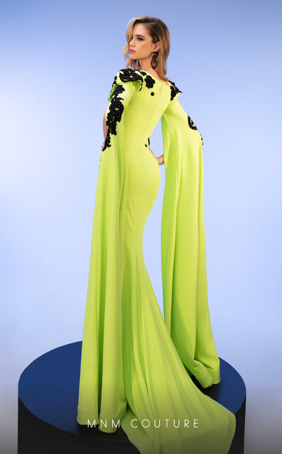 Radiate glamour in the sophisticated MNM Couture F02802 gown, deftly designed with a flattering V-neck cut and elegant tassel embellishments for the perfect evening allure. | Couture Shop LA