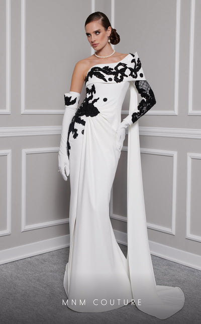 Elegant MNM Couture F02803 evening gown featuring a strapless, off-shoulder design with a single long sleeve, adorned with intricate beading and tassels | Couture Shop LA