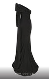Elegant MNM Couture F02803 evening gown featuring a strapless, off-shoulder design with a single long sleeve, adorned with intricate beading and tassels | Couture Shop LA