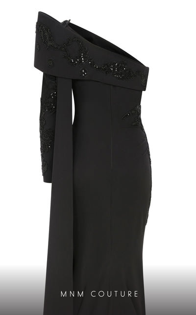 Elegant MNM Couture F02803 evening gown featuring a strapless, off-shoulder design with a single long sleeve, adorned with intricate beading and tassels | Couture Shop LA