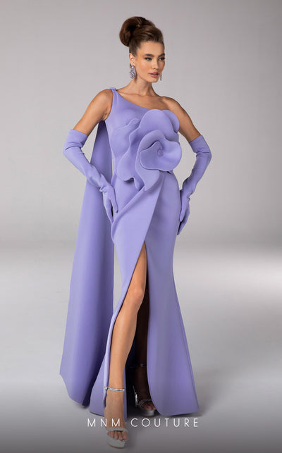 Discover the essence of evening sophistication with the MNM Couture F02826, a luxurious crepe gown embellished with a classical rose, tailored for the exclusive tastes of red carpet and special occasion aficionados. | Couture Shop LA