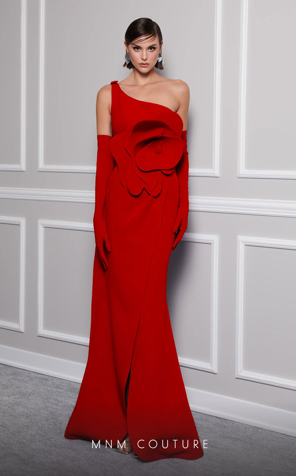 Discover the essence of evening sophistication with the MNM Couture F02826, a luxurious crepe gown embellished with a classical rose, tailored for the exclusive tastes of red carpet and special occasion aficionados. | Couture Shop LA