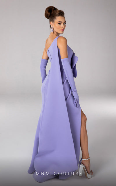 Discover the essence of evening sophistication with the MNM Couture F02826, a luxurious crepe gown embellished with a classical rose, tailored for the exclusive tastes of red carpet and special occasion aficionados. | Couture Shop LA
