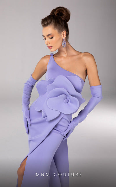 Discover the essence of evening sophistication with the MNM Couture F02826, a luxurious crepe gown embellished with a classical rose, tailored for the exclusive tastes of red carpet and special occasion aficionados. | Couture Shop LA