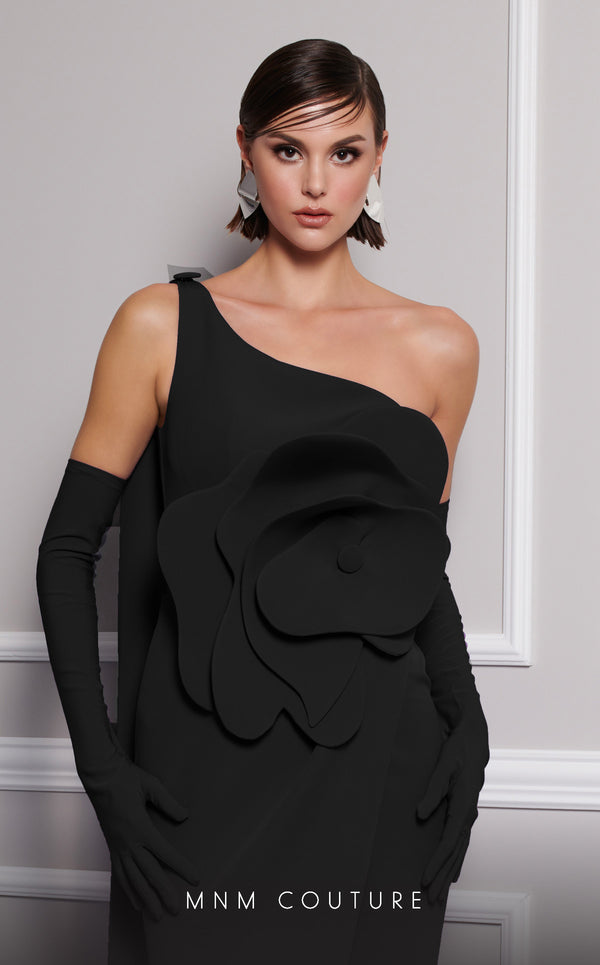 Discover the essence of evening sophistication with the MNM Couture F02826, a luxurious crepe gown embellished with a classical rose, tailored for the exclusive tastes of red carpet and special occasion aficionados. | Couture Shop LA