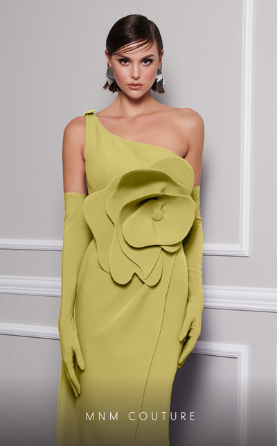 Discover the essence of evening sophistication with the MNM Couture F02826, a luxurious crepe gown embellished with a classical rose, tailored for the exclusive tastes of red carpet and special occasion aficionados. | Couture Shop LA