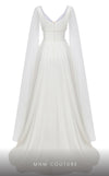 MNM Couture F02828A A-line gown with cape sleeves, beaded appliques, and sweeping train. | Couture Shop LA