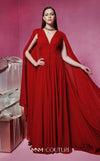 MNM Couture Style F02845 red evening dress with cape-style long sleeves, V-neckline, tailored waistline adorned with buttons, and long flowing train | Couture Shop LA.