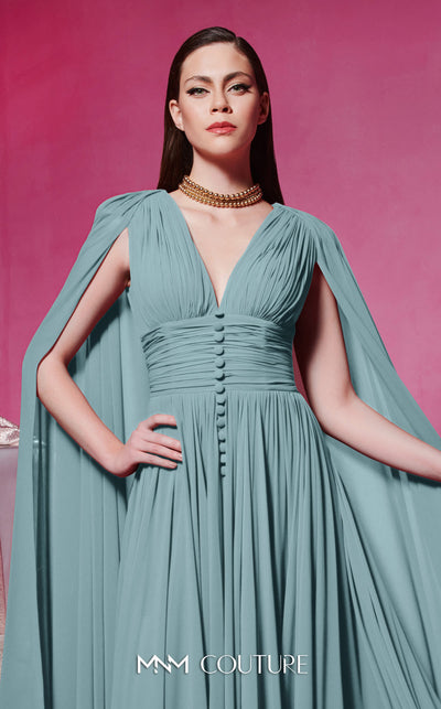 MNM Couture Style F02845 red evening dress with cape-style long sleeves, V-neckline, tailored waistline adorned with buttons, and long flowing train | Couture Shop LA.