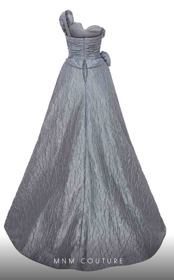 MNM Couture F02877 brocade gown with asymmetrical neckline and rosette. | Couture Shop LA
