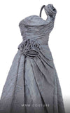 MNM Couture F02877 brocade gown with asymmetrical neckline and rosette. | Couture Shop LA