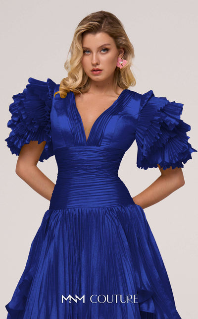 MNM Couture F02885 V-neck gown with accordion pleats and layered skirt. | Couture Shop LA