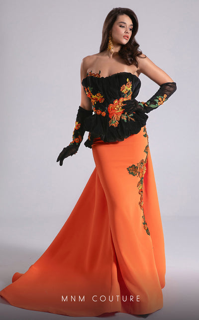 MNM Couture F02902 strapless gown with black embroidered velvet corset top, vibrant orange floor-length skirt, and matching gloves. | Couture Shop LA