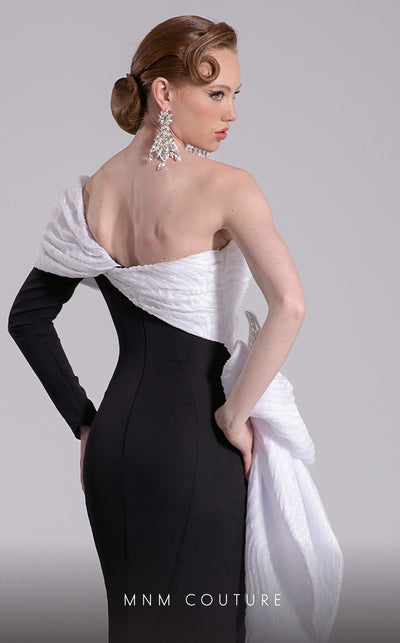 MNM Couture Style F02907 featuring an asymmetric mermaid gown with a large pleated organza bow, one off-shoulder cap sleeve, and crystal embellishments on the bodice. | Couture Shop LA