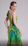 MNM Couture Style F02911 one-shoulder green gown with a draped bodice, floral appliqués at shoulder and hip, and a large pleated ombre ruffle train. | Couture Shop LA