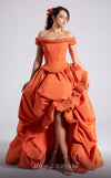 MNM Couture Style F02913 featuring an orange taffeta dress with off-shoulder cap sleeves, drapery on the neckline and waist, a high-low skirt with a cascading train, and a floral accent. | MNM Couture.