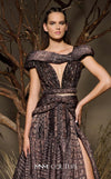MNM Couture Style F02922 featuring a two-piece look organza gown in a brown textured crocodile print, with a deep V-neckline, cap sleeves, and a long pleated skirt. | Couture Shop LA