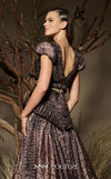 MNM Couture Style F02922 featuring a two-piece look organza gown in a brown textured crocodile print, with a deep V-neckline, cap sleeves, and a long pleated skirt. | Couture Shop LA