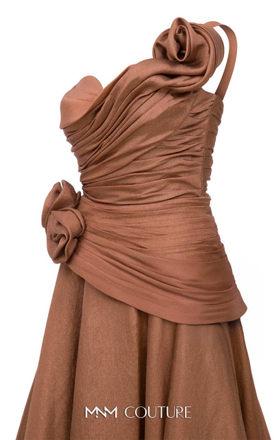 MNM Couture Style F02923 A-line gown featuring asymmetric neckline, fabric flower strap detail, pleated bust, and two floral accents at the waist | Couture Shop LA