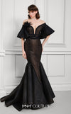 MNM Couture Style F02925 - Elegant black mesh mermaid gown featuring off-shoulder ruffled bell sleeves, a deep V-neckline, and a plumage brooch. | Couture Shop LA